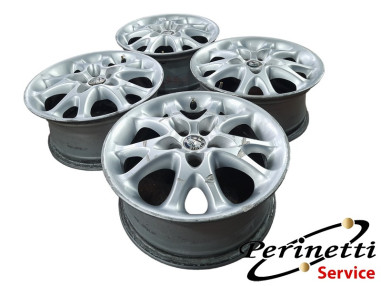 4 CERCHI IN LEGA R15 5 FORI ALFA...