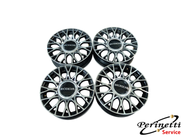 4 CERCHI IN LEGA R15 4 FORI MICROCAR M8